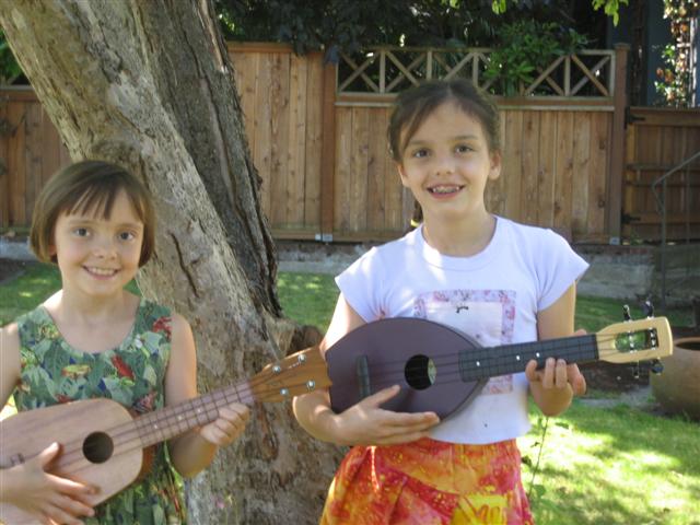 Christine and Kathryn learn to play 'ukulele